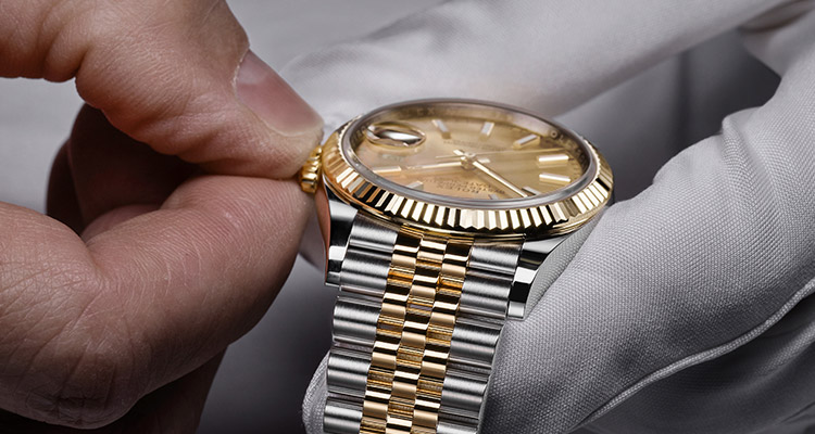 A Rolex watch being serviced